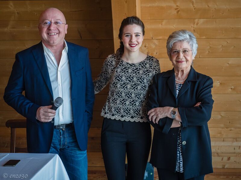 Three generations of the Sordo family standing together, including the father, grandmother, and daughter, representing the family heritage of the Sordo winery.